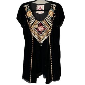 Johnny was small black velvet dress/tunic with embroidery